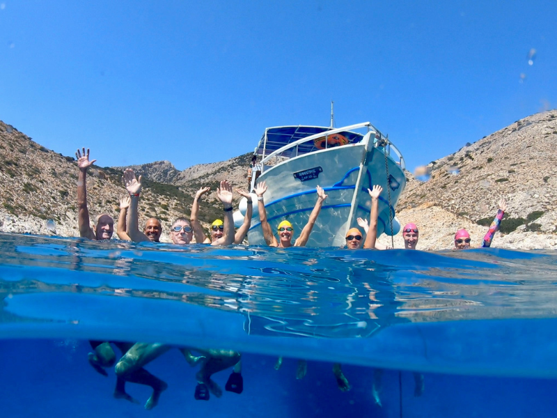 SwimTrekkers with the boat